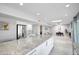 Open floor plan of kitchen leading to the living room and fireplace at 1806 W Rosewood Ct, Chandler, AZ 85224