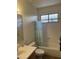 Clean and well-maintained bathroom with a shower-tub combination, and a vanity with sink at 18131 W Addie Ln, Surprise, AZ 85374