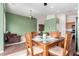 Open-concept breakfast nook with view to living room and kitchen at 18131 W Addie Ln, Surprise, AZ 85374