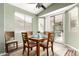 Inviting breakfast nook with table, chairs, and sliding door to the outdoor patio at 18131 W Addie Ln, Surprise, AZ 85374