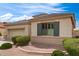 Charming single-story home features low-maintenance landscaping, tile roof, and two car garage at 18131 W Addie Ln, Surprise, AZ 85374