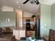 Bright kitchen with stainless steel appliances, plenty of counter space, and updated cabinetry at 18131 W Addie Ln, Surprise, AZ 85374