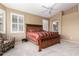 Comfortable main bedroom showcasing large bed and natural light at 18131 W Addie Ln, Surprise, AZ 85374
