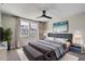 Serene bedroom with large window, neutral tones, and plush carpeting at 1823 E Chelsea Ln # 106, Gilbert, AZ 85295