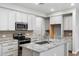 Stylish kitchen with stainless steel appliances, granite countertops, and ample cabinet space at 1823 E Chelsea Ln # 106, Gilbert, AZ 85295