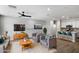 Open-concept living area flows into kitchen with granite countertops and bar seating at 1823 E Chelsea Ln # 106, Gilbert, AZ 85295