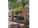 Stone pavilion with picnic tables, providing a shaded gathering space in a well-maintained community area at 1823 E Chelsea Ln # 106, Gilbert, AZ 85295