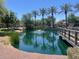 Community pond with fountain and landscaping at 1823 E Chelsea Ln # 106, Gilbert, AZ 85295