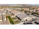 Aerial shot of a home with a well-kept backyard and mountain views at 18929 W Windsor Blvd, Litchfield Park, AZ 85340