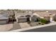 Well-maintained single-Gathering home with a two-car garage and desert landscaping at 18929 W Windsor Blvd, Litchfield Park, AZ 85340