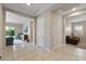Bright foyer with tile flooring, leading to the living spaces at 18929 W Windsor Blvd, Litchfield Park, AZ 85340