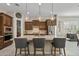 Spacious kitchen with center island, granite countertops, and pendant lighting at 18929 W Windsor Blvd, Litchfield Park, AZ 85340