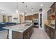 Stylish kitchen with island seating, updated appliances, and ample cabinet space at 18929 W Windsor Blvd, Litchfield Park, AZ 85340