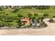 Aerial view of a neighborhood park with playground, picnic area, and mature landscaping at 18929 W Windsor Blvd, Litchfield Park, AZ 85340