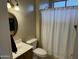 Clean bathroom with a shower, toilet, vanity, and a well-lit mirror at 19139 N Alameda Dr, Surprise, AZ 85387
