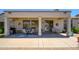 Comfortable back porch with a ceiling fan, patio furniture, and a barbecue for entertaining at 19892 N Shadow Mountain Dr, Surprise, AZ 85374