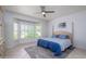 Serene main bedroom featuring a bay window, a plush bed, and a calming color scheme at 19892 N Shadow Mountain Dr, Surprise, AZ 85374