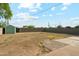 Backyard featuring a storage shed and partially covered in decorative rock at 2015 W Weldon Ave, Phoenix, AZ 85015