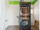Efficient laundry area equipped with a stacked washer and dryer at 2015 W Weldon Ave, Phoenix, AZ 85015