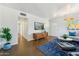 Spacious living room featuring modern furniture and stylish decor elements at 2015 W Weldon Ave, Phoenix, AZ 85015