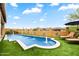Stunning private pool with water fountains, lush green turf, and comfortable lounge chairs for relaxation at 2114 N Canelo Hls, Mesa, AZ 85207