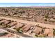 Aerial view of community with multiple single-Gathering homes and neighborhood streets at 21200 E Camacho Rd, Queen Creek, AZ 85142