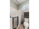 Bathroom showcasing walk-in tub and accessible fixtures at 21200 E Camacho Rd, Queen Creek, AZ 85142