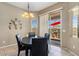 Eat-in kitchen features sliding glass doors and views of the outdoor patio at 21200 E Camacho Rd, Queen Creek, AZ 85142