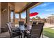 This charming outdoor patio is perfect for entertaining or relaxing with an outdoor dining set at 21200 E Camacho Rd, Queen Creek, AZ 85142