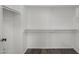 Walk-in closet featuring built-in shelving and hanging rods for ample storage at 2152 E Casitas Del Rio Dr, Phoenix, AZ 85024