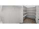 Well-organized walk-in closet with custom shelving and ample storage space at 2152 E Casitas Del Rio Dr, Phoenix, AZ 85024