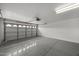 Spacious two-car garage with epoxy flooring, offering ample parking and storage space at 2152 E Casitas Del Rio Dr, Phoenix, AZ 85024