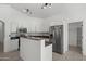 Bright kitchen featuring white cabinets, stainless steel appliances, and tiled floors at 2152 E Casitas Del Rio Dr, Phoenix, AZ 85024