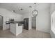 Open kitchen and dining area with stainless steel appliances and tiled floors at 2152 E Casitas Del Rio Dr, Phoenix, AZ 85024