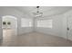 Bright living room features tile flooring, neutral paint, recessed lights, and large window at 2152 E Casitas Del Rio Dr, Phoenix, AZ 85024