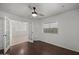 Bright office with wood floors, ceiling fan, and glass French doors at 2152 E Casitas Del Rio Dr, Phoenix, AZ 85024
