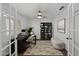 Modern home office with built-in shelving, a ceiling fan, a neutral color palette, and natural lighting at 2152 E Casitas Del Rio Dr, Phoenix, AZ 85024