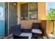 Cozy balcony featuring comfortable wicker chairs and an outdoor sitting area at 22125 N 29Th Ave # 137, Phoenix, AZ 85027