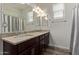 Bathroom with double vanity, granite countertops, and decorative lighting at 22125 N 29Th Ave # 137, Phoenix, AZ 85027