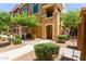 Inviting townhome with well-maintained landscaping, sidewalk, and charming facade at 22125 N 29Th Ave # 137, Phoenix, AZ 85027