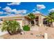 Charming single-story home featuring desert landscaping, a two-car garage, and a welcoming front entrance at 22351 N 67Th Dr, Glendale, AZ 85310