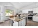 Eat-in kitchen with a large island and stainless steel appliances at 22351 N 67Th Dr, Glendale, AZ 85310