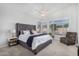 Spacious main bedroom with large windows and a ceiling fan at 22351 N 67Th Dr, Glendale, AZ 85310