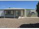 The backyard patio has an aluminum roof with sliding doors to the house at 2528 N Lema Dr, Mesa, AZ 85215