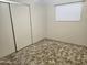 Bedroom featuring wall to wall carpeting and sliding door wardrobe at 2528 N Lema Dr, Mesa, AZ 85215