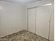 Bedroom featuring wall to wall carpeting and sliding door wardrobe at 2528 N Lema Dr, Mesa, AZ 85215