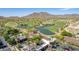 Golf course and clubhouse with scenic mountain views in the background at 2540 N Stone Hill Rd, Buckeye, AZ 85396