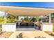 Inviting community patio featuring comfortable seating, providing a relaxing outdoor space for residents at 2540 N Stone Hill Rd, Buckeye, AZ 85396