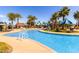 Resort-style community pool offers a relaxing and fun area for residents to enjoy on sunny days at 2540 N Stone Hill Rd, Buckeye, AZ 85396
