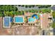 Birds eye view of a resort style community pool with basketball court and lush landscape at 2540 N Stone Hill Rd, Buckeye, AZ 85396